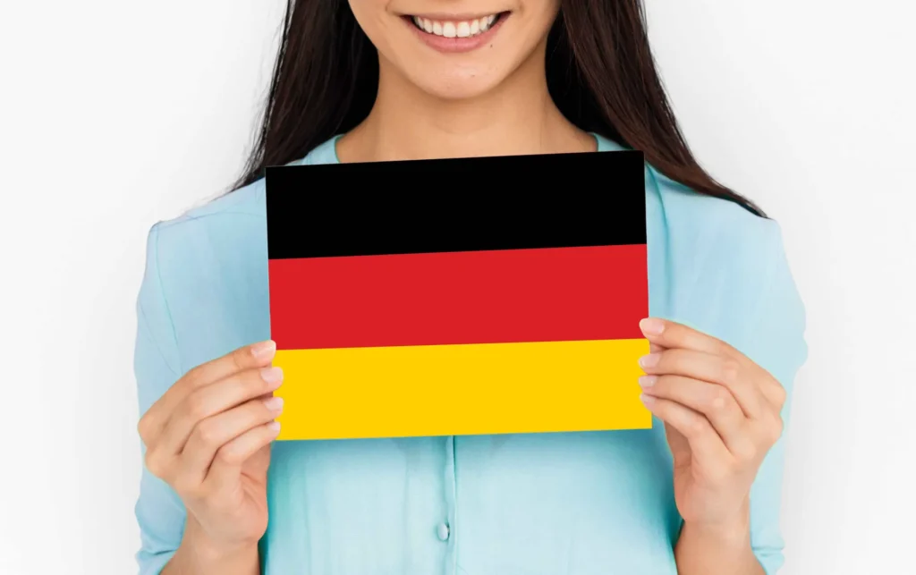 sms-fulfillment-blog-woman-hands-hold-germany-deutschland-flag-patriotism
