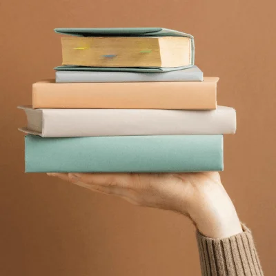hand holding books